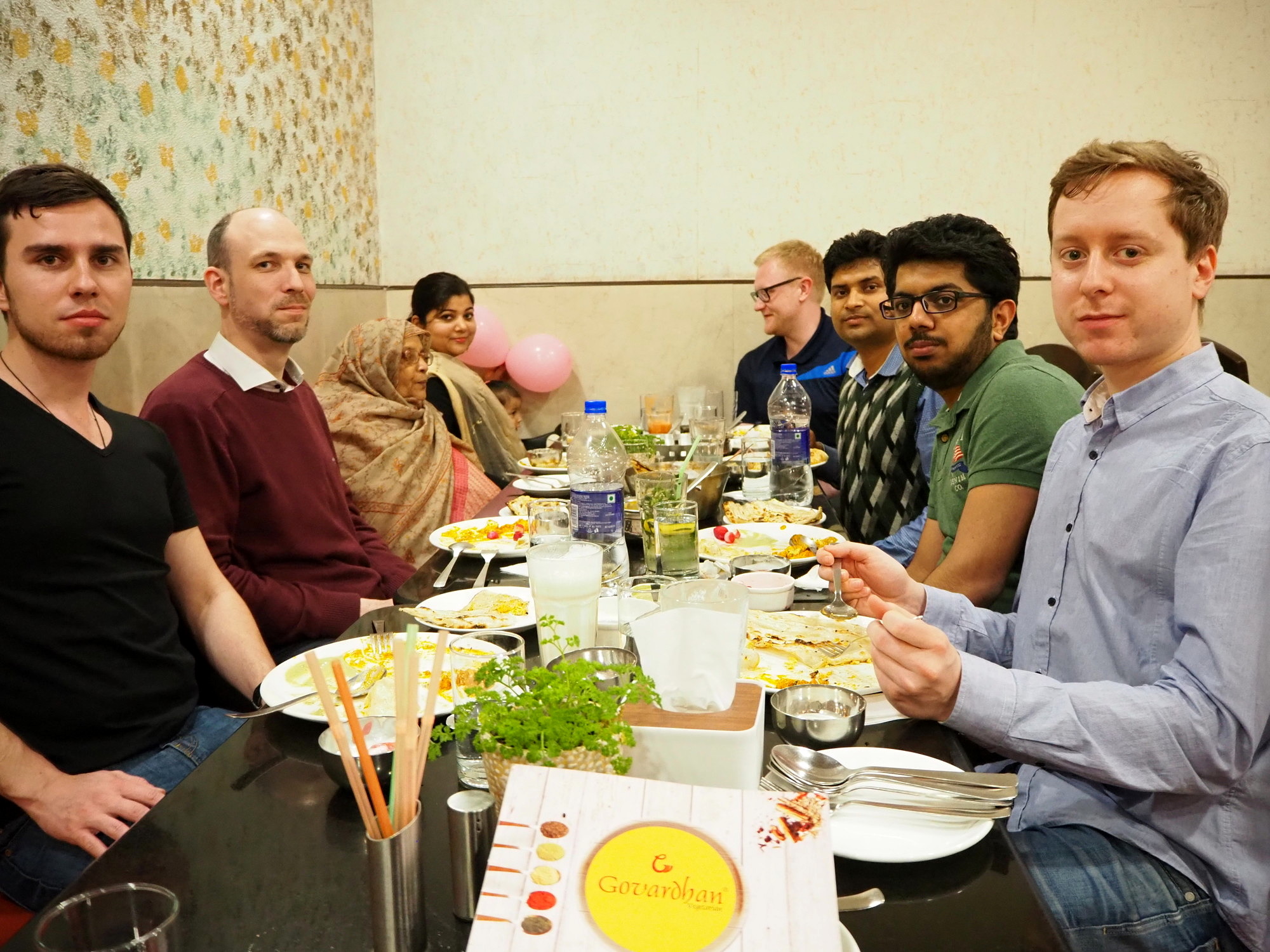 Group photo of six researchers and three family members from the technical faculties at Friedrich-Alexander-Universität Erlangen-Nürnberg and the Indian Institute of Technology Delhi while having dinner in Delhi.