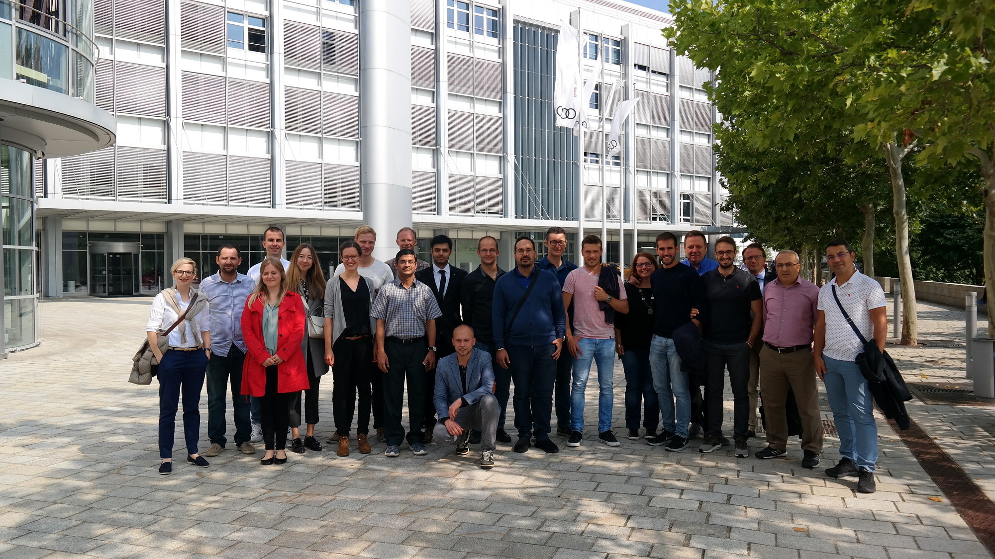 Group photo of 22 researchers from the technical faculties at Friedrich-Alexander-Universität Erlangen-Nürnberg and the Indian Institute of Technology Delhi visiting AUDI in Ingolstadt.